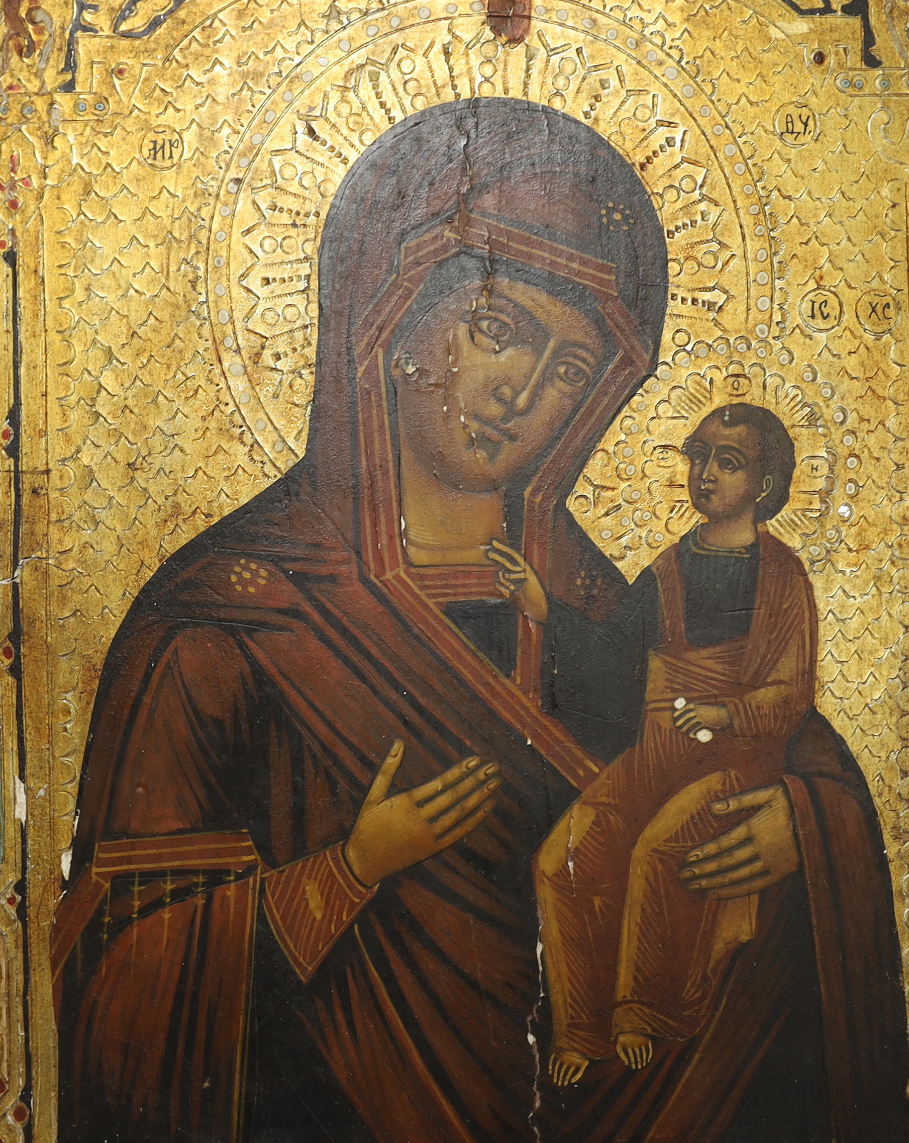 Late 19th century Russian School, hand painted Icon on panel, with stand, 26 x 21cm, unframed